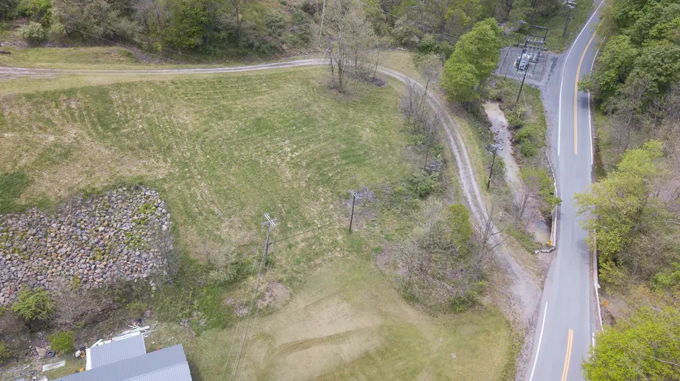 Aerial view of the paved road frontage and drive